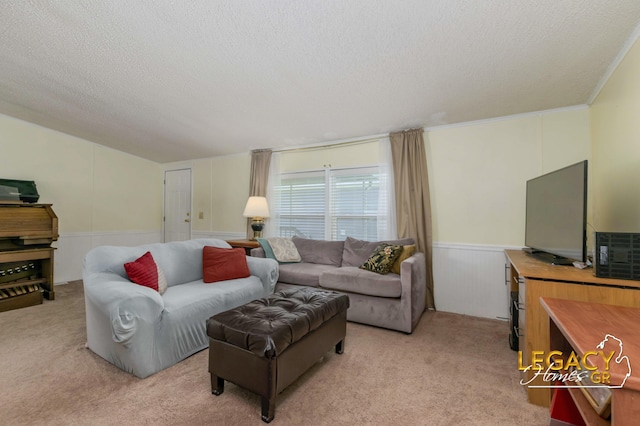 1163 Maple Leaf Ln NW, Walker, MI 49534 - living area featuring a textured ceiling, light colored carpet, and wainscoting