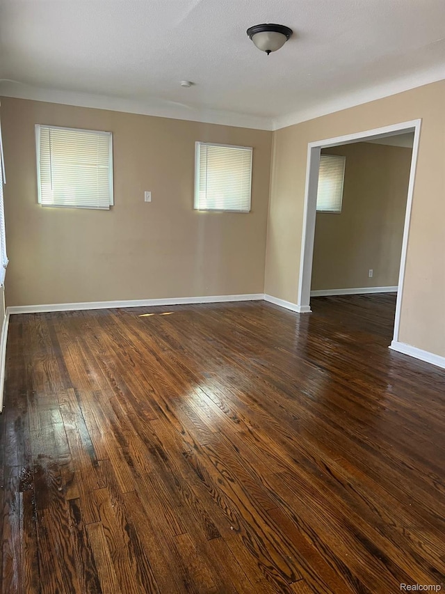 18995 Wormer St, Detroit, MI 48219 - spare room featuring dark wood finished floors