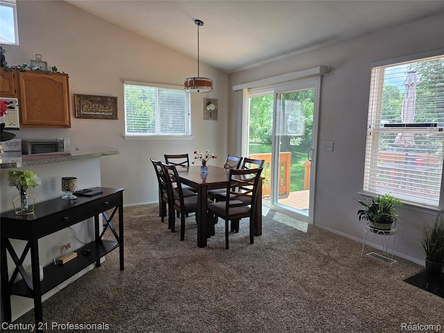 37329 Amhurst Dr Unit 23, Westland, MI 48185 - dining space with carpet floors and vaulted ceiling