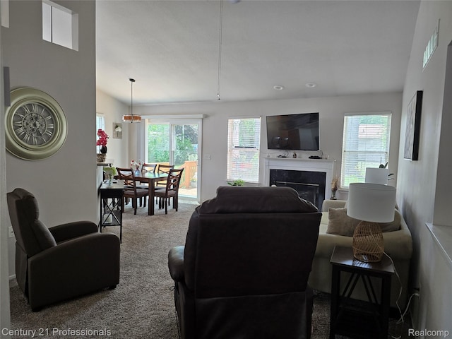 37329 Amhurst Dr Unit 23, Westland, MI 48185 - living area featuring a fireplace, carpet, and lofted ceiling