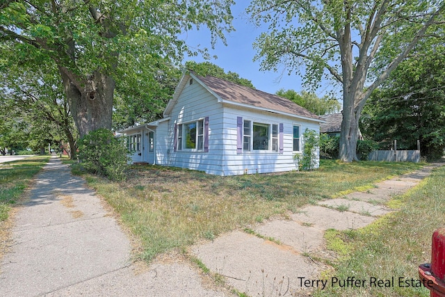 1966 Roilson St, Muskegon, MI 49441 - view of property exterior with driveway