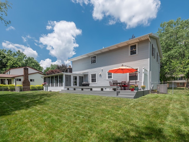 1627 Whitby Ave, Portage, MI 49024 - back of house with a sunroom and a patio