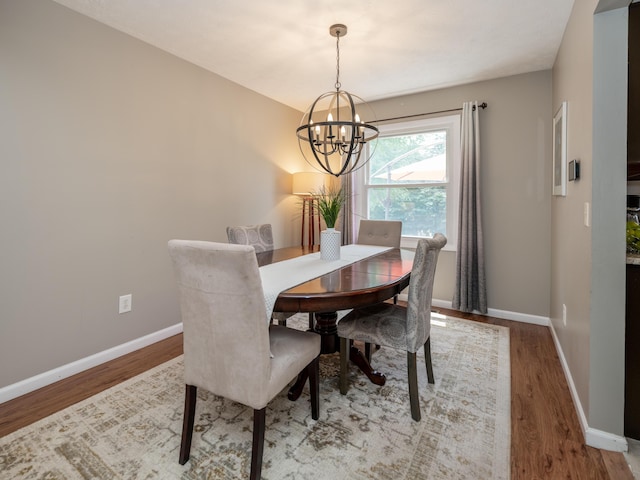 1627 Whitby Ave, Portage, MI 49024 - dining space featuring a chandelier and wood finished floors