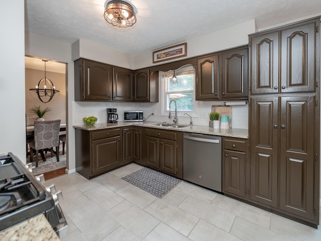 1627 Whitby Ave, Portage, MI 49024 - kitchen featuring dishwasher, a chandelier, dark brown cabinets, range with gas cooktop, and light stone counters