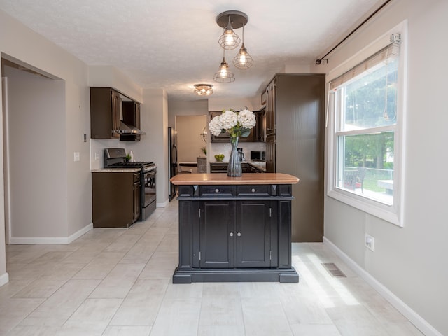 1627 Whitby Ave, Portage, MI 49024 - kitchen with range with gas cooktop, refrigerator, under cabinet range hood, and a center island