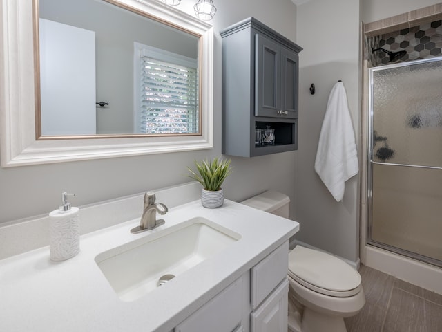1627 Whitby Ave, Portage, MI 49024 - bathroom featuring a shower stall and vanity