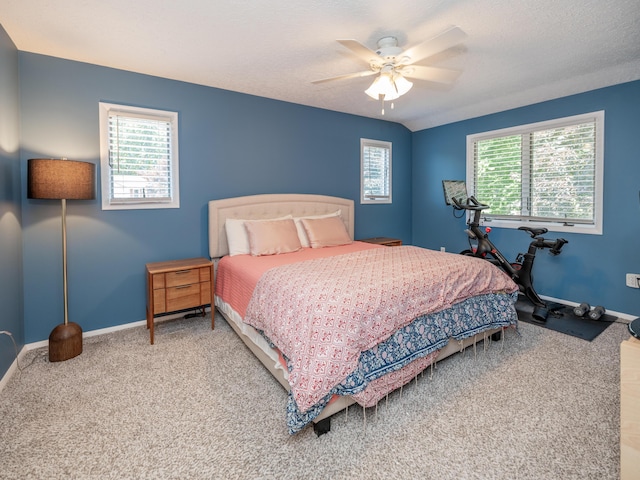 1627 Whitby Ave, Portage, MI 49024 - carpeted bedroom with baseboards and ceiling fan