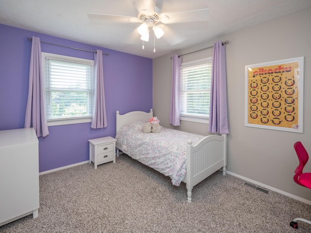 1627 Whitby Ave, Portage, MI 49024 - carpeted bedroom featuring baseboards and a ceiling fan