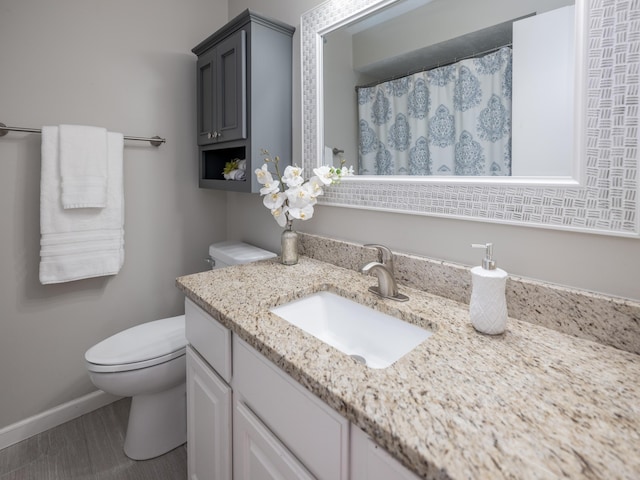1627 Whitby Ave, Portage, MI 49024 - bathroom with vanity and wood finished floors