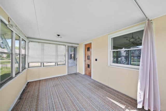 8020 Greenes Dr, Jackson, MI 49201 - unfurnished sunroom with carpet flooring