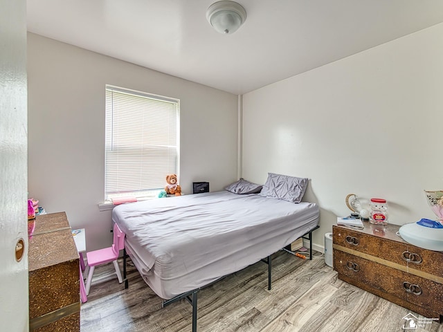 926 E Front St, Monroe, MI 48161 - bedroom with wood finished floors