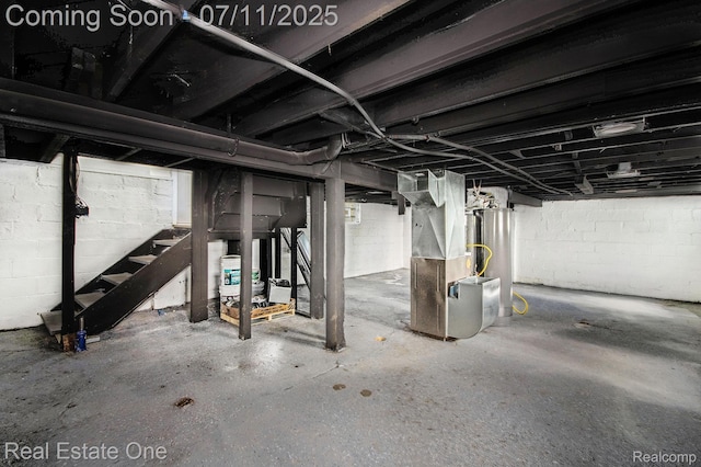 271 College St, Southfield, MI 48220 - unfinished below grade area featuring stairs, heating unit, and gas water heater