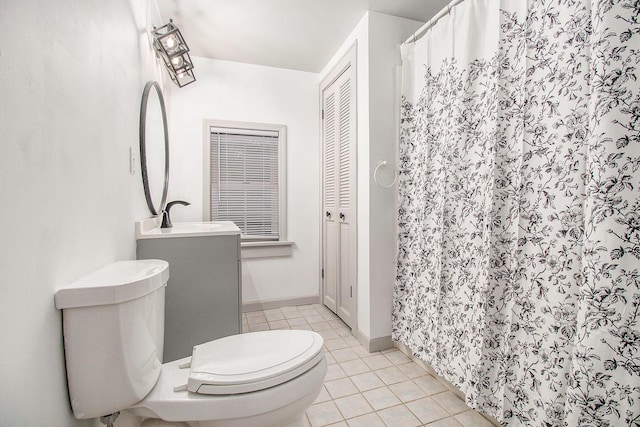 838 Lakeway Ave, Kalamazoo, MI 49001 - full bathroom with a closet, tile patterned floors, vanity, and a shower with curtain