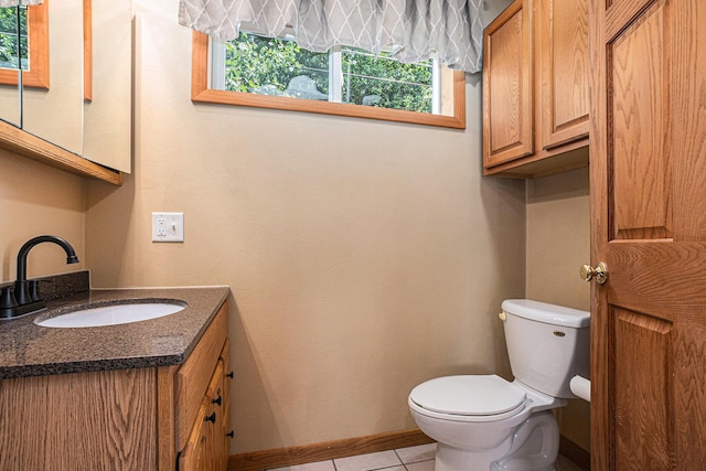 1109 Goguac St W, Battle Creek, MI 49015 - bathroom with vanity and tile patterned floors