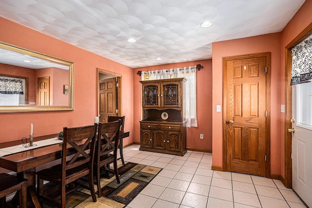 1109 Goguac St W, Battle Creek, MI 49015 - dining room with light tile patterned flooring and baseboards