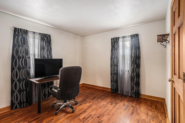 1109 Goguac St W, Battle Creek, MI 49015 - office with hardwood / wood-style flooring and baseboards
