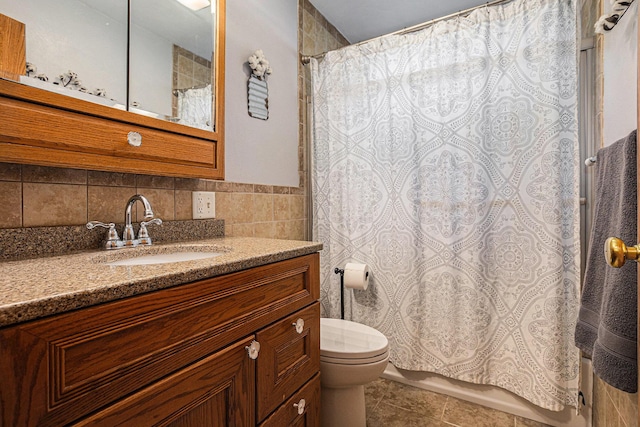 1109 Goguac St W, Battle Creek, MI 49015 - full bath featuring vanity, tile patterned floors, tile walls, and shower / bathtub combination with curtain