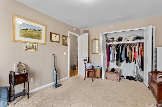 22145 W Village Dr, Dearborn, MI 48124 - carpeted bedroom with a closet and baseboards