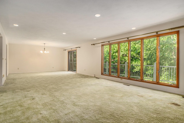 45745 County Road 652, Mattawan, MI 49071 - empty room featuring a chandelier, healthy amount of natural light, carpet, and recessed lighting