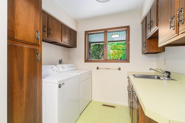 45745 County Road 652, Mattawan, MI 49071 - laundry room featuring washer and dryer, cabinet space, and light flooring