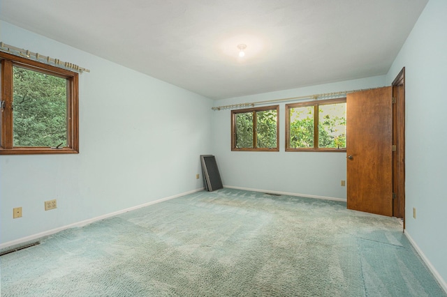 45745 County Road 652, Mattawan, MI 49071 - unfurnished room featuring carpet floors and plenty of natural light