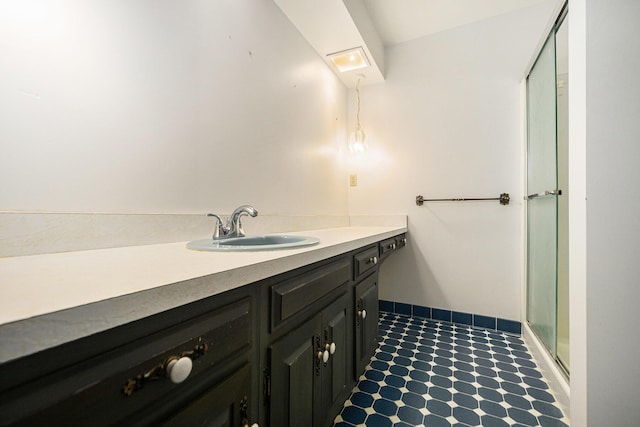 45745 County Road 652, Mattawan, MI 49071 - bathroom featuring vanity, an enclosed shower, and tile patterned floors