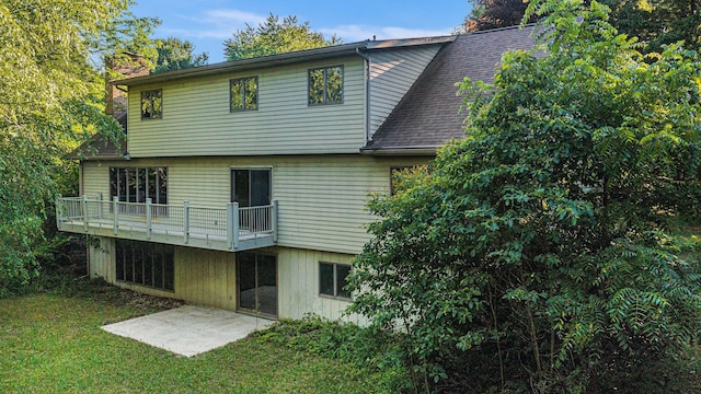 45745 County Road 652, Mattawan, MI 49071 - back of property featuring a chimney, a yard, and a shingled roof