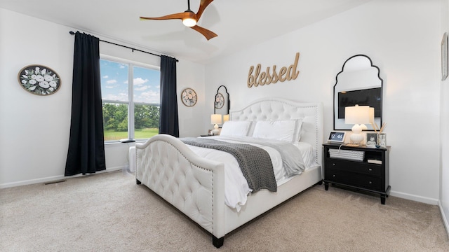 3850 Diuble Rd, Ann Arbor, MI 48103 - carpeted bedroom with baseboards and a ceiling fan