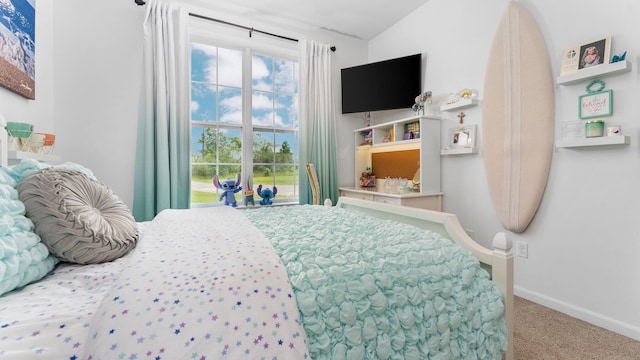 3850 Diuble Rd, Ann Arbor, MI 48103 - carpeted bedroom featuring vaulted ceiling and baseboards