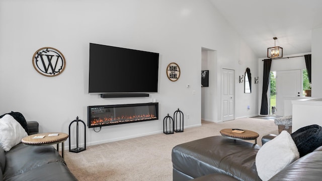 3850 Diuble Rd, Ann Arbor, MI 48103 - carpeted living room with high vaulted ceiling and a glass covered fireplace