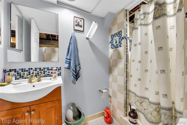 12876 Martin Rd, Warren, MI 48088 - bathroom featuring vanity, backsplash, and tile patterned floors