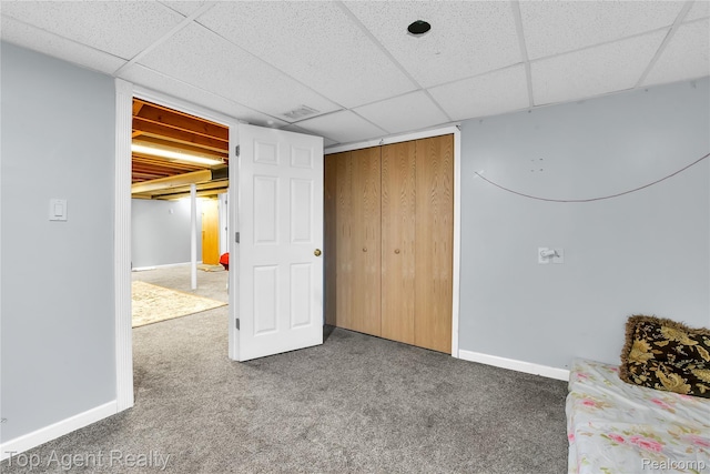 12876 Martin Rd, Warren, MI 48088 - unfurnished bedroom with a drop ceiling, carpet floors, and a closet