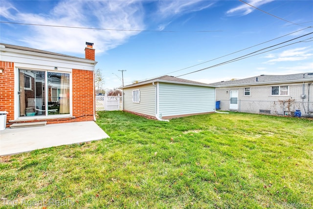 12876 Martin Rd, Warren, MI 48088 - view of yard featuring a patio area and an outdoor structure