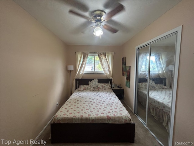 12876 Martin Rd, Warren, MI 48088 - bedroom featuring dark carpet, a closet, and ceiling fan