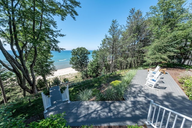 4569 N Ridge Rd, Mears, MI 49436 - view of yard with a view of the beach and a deck with water view