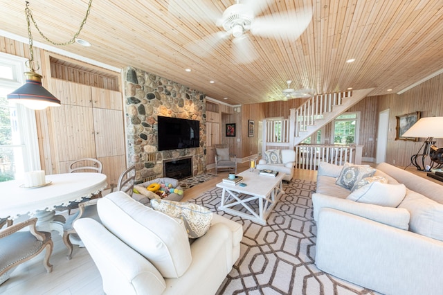 4569 N Ridge Rd, Mears, MI 49436 - living area with wood walls, wood ceiling, ceiling fan, wood finished floors, and recessed lighting