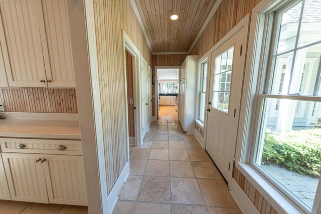 4569 N Ridge Rd, Mears, MI 49436 - hall featuring stone tile flooring, recessed lighting, and wooden ceiling