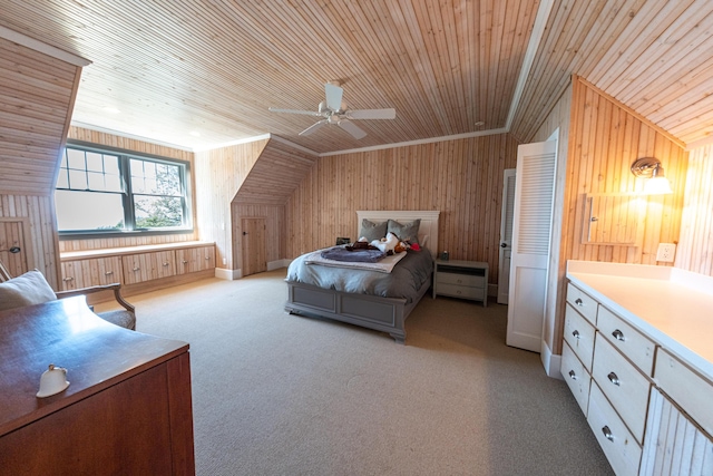 4569 N Ridge Rd, Mears, MI 49436 - bedroom with wood walls, wood ceiling, carpet floors, and a ceiling fan