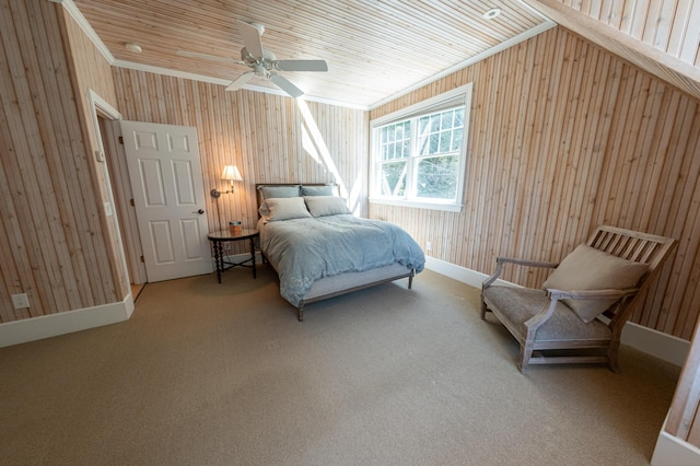 4569 N Ridge Rd, Mears, MI 49436 - carpeted bedroom featuring wooden walls and a ceiling fan