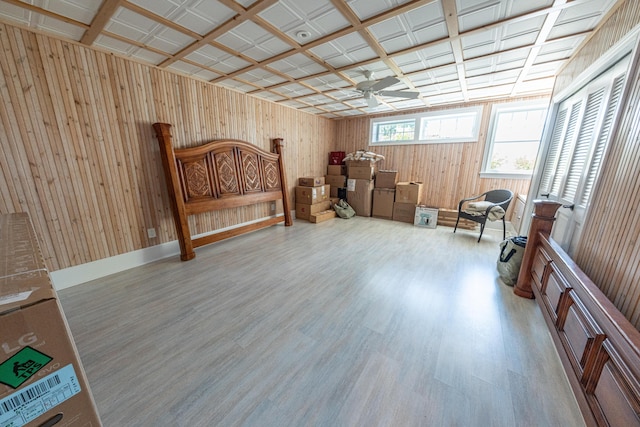 4569 N Ridge Rd, Mears, MI 49436 - bedroom featuring wood finished floors and wooden walls