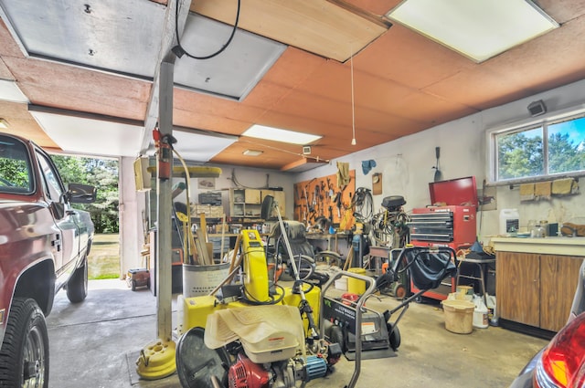 3914 135th Ave, Hersey, MI 49639 - garage with a workshop area