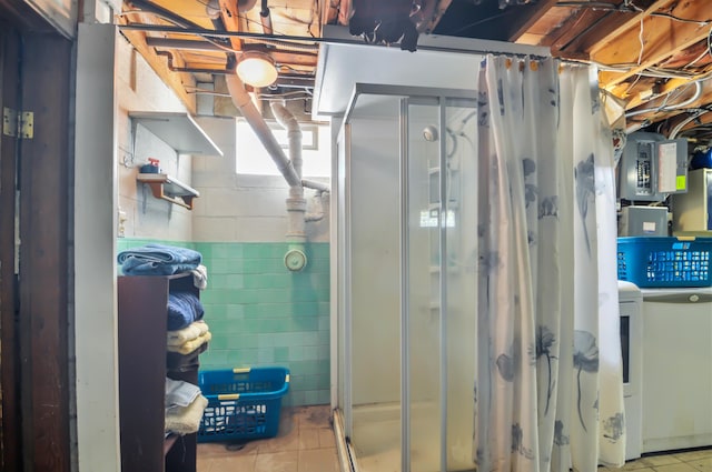 3914 135th Ave, Hersey, MI 49639 - basement featuring electric panel, tile patterned flooring, and concrete block wall