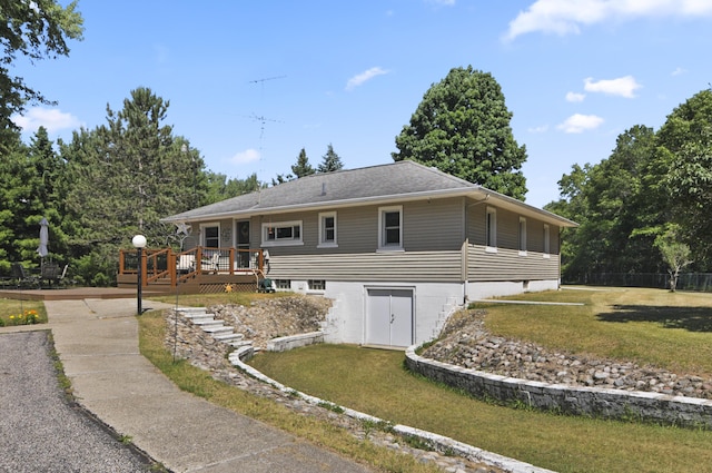 3914 135th Ave, Hersey, MI 49639 - back of property with a deck and a lawn