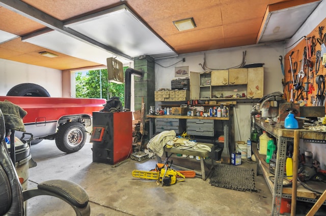 3914 135th Ave, Hersey, MI 49639 - garage featuring a workshop area