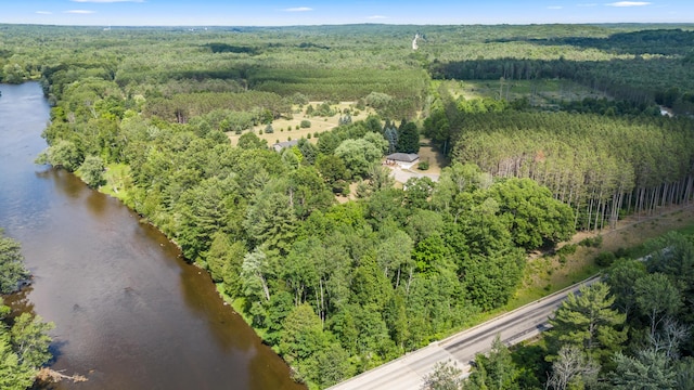 3914 135th Ave, Hersey, MI 49639 - aerial view of property and surrounding area with a heavily wooded area and a nearby body of water