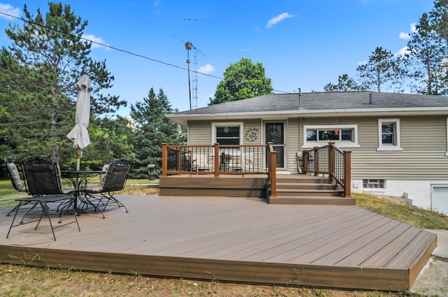 3914 135th Ave, Hersey, MI 49639 - back of house with a wooden deck and outdoor dining area