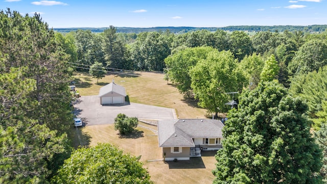 3914 135th Ave, Hersey, MI 49639 - aerial view of property and surrounding area with a heavily wooded area