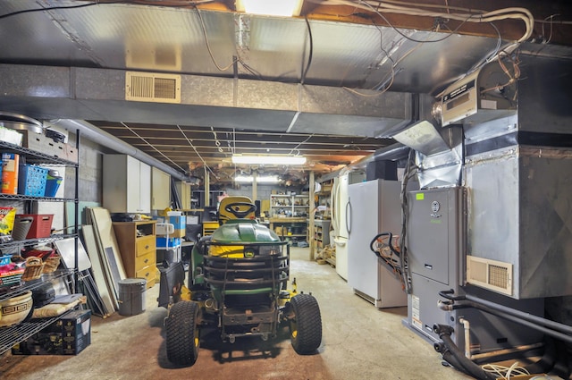3914 135th Ave, Hersey, MI 49639 - unfinished below grade area featuring freestanding refrigerator