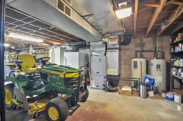 3914 135th Ave, Hersey, MI 49639 - garage featuring water heater, heating unit, and concrete block wall