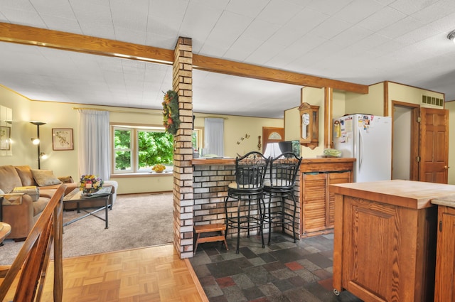 3914 135th Ave, Hersey, MI 49639 - dining space featuring a bar and beam ceiling